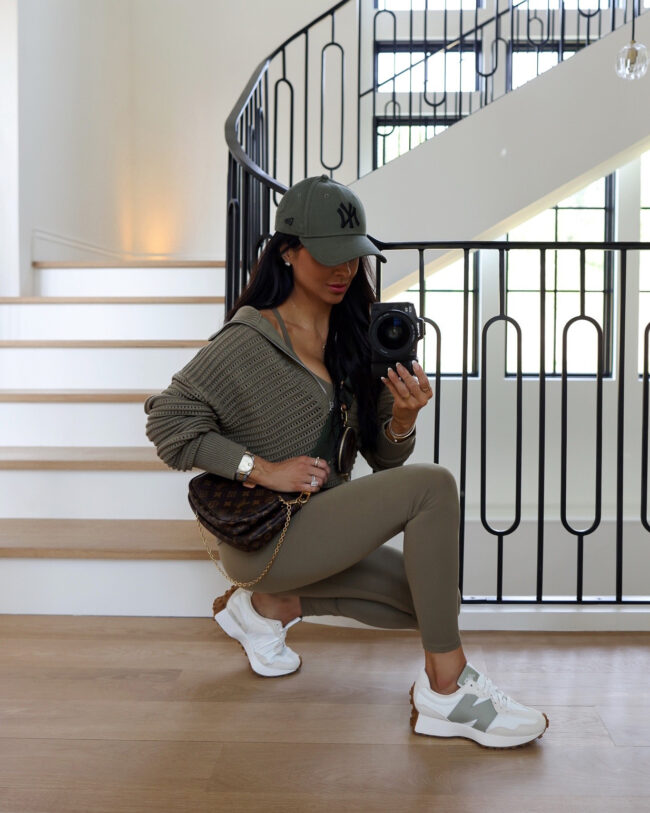 mia mia mine wearing new balance 327 sneakers from the nsale