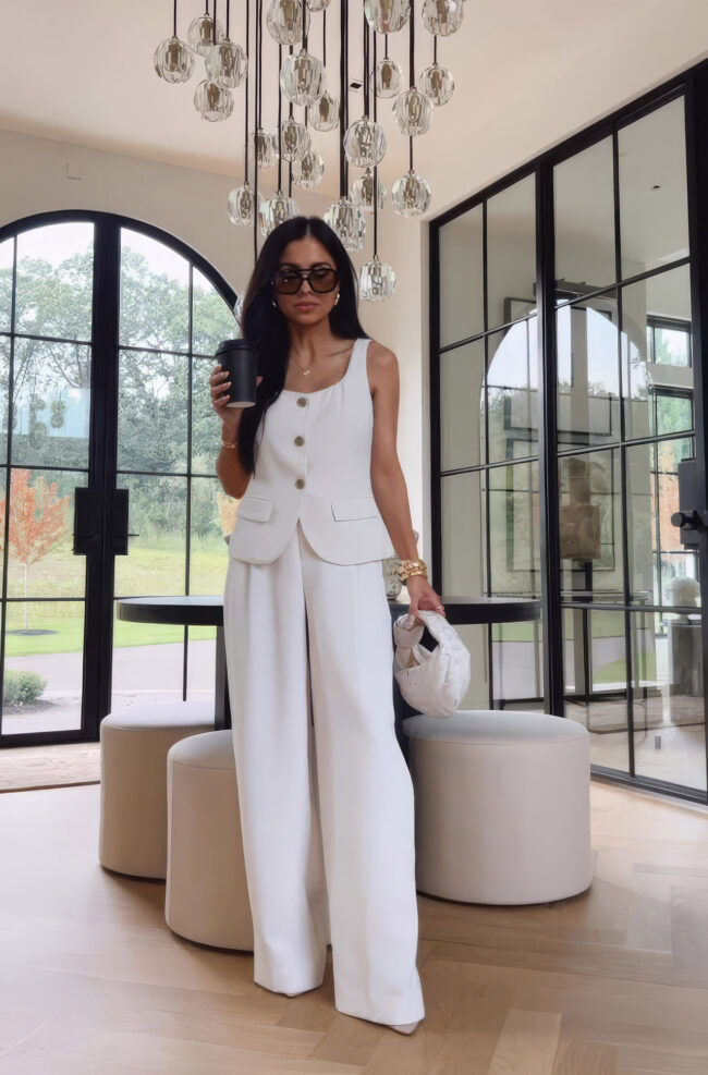 brunette fashion blogger wearing target white trousers for summer