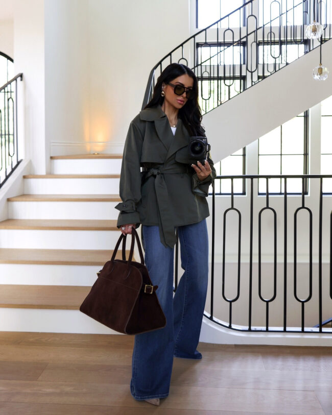 mia mia mine wearing a brown suede tote from amazon