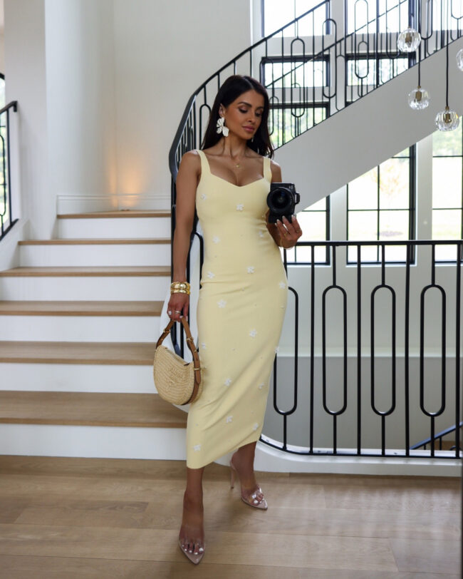 mia mia mine wearing a butter yellow dress from zara