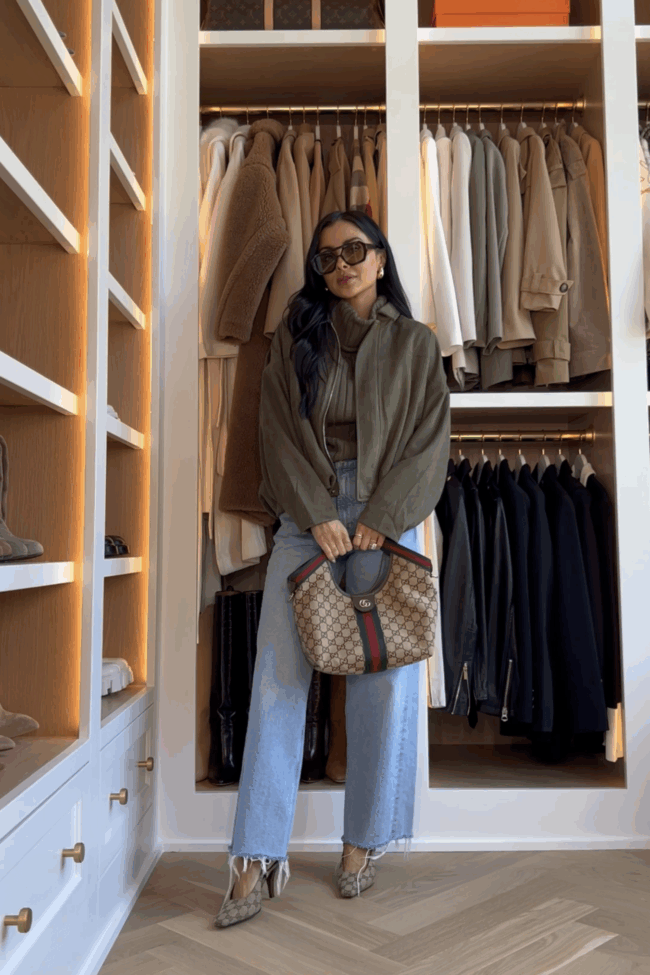 brunette fashion blogger wearing a faux suede bomber jacket from amazon