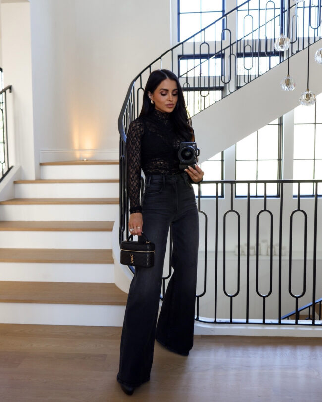 brunette fashion blogger wearing mother black denim for fall