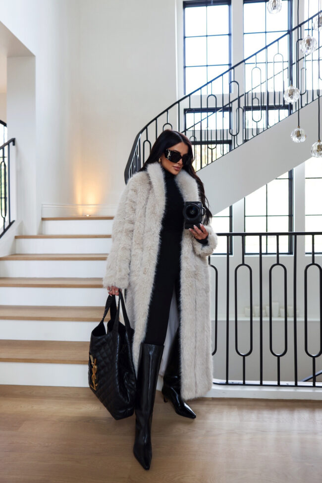 mia mia mine wearing an all black fall outfit with a faux fur coat