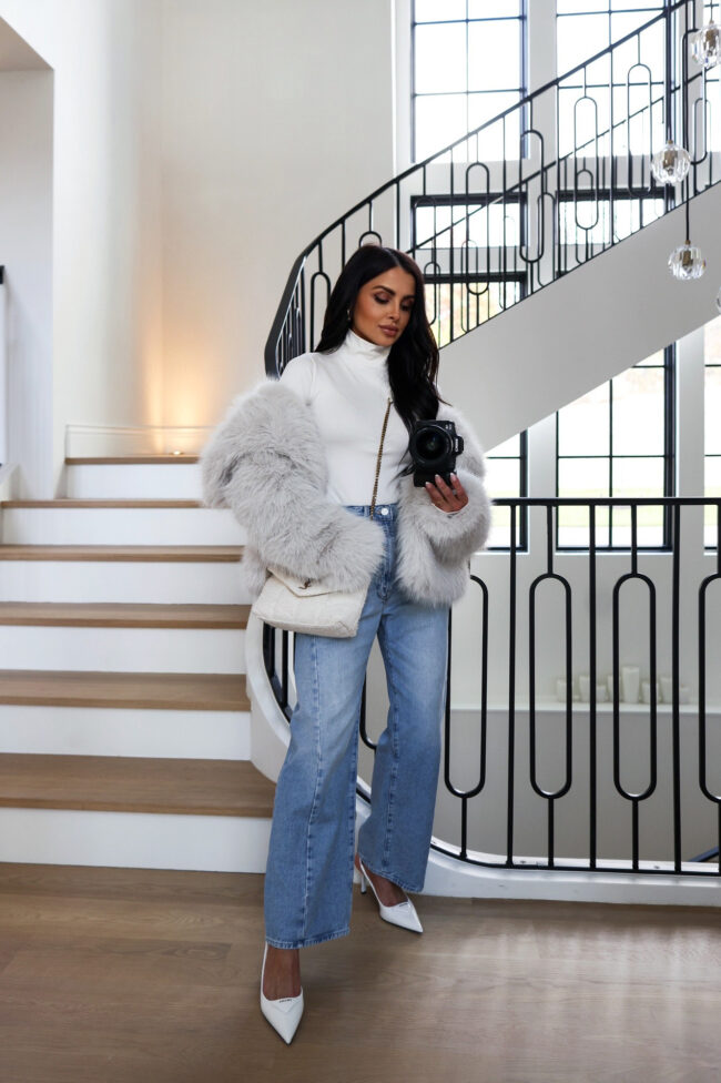 fashion blogger wearing a cropped faux fur coat and barrel denim