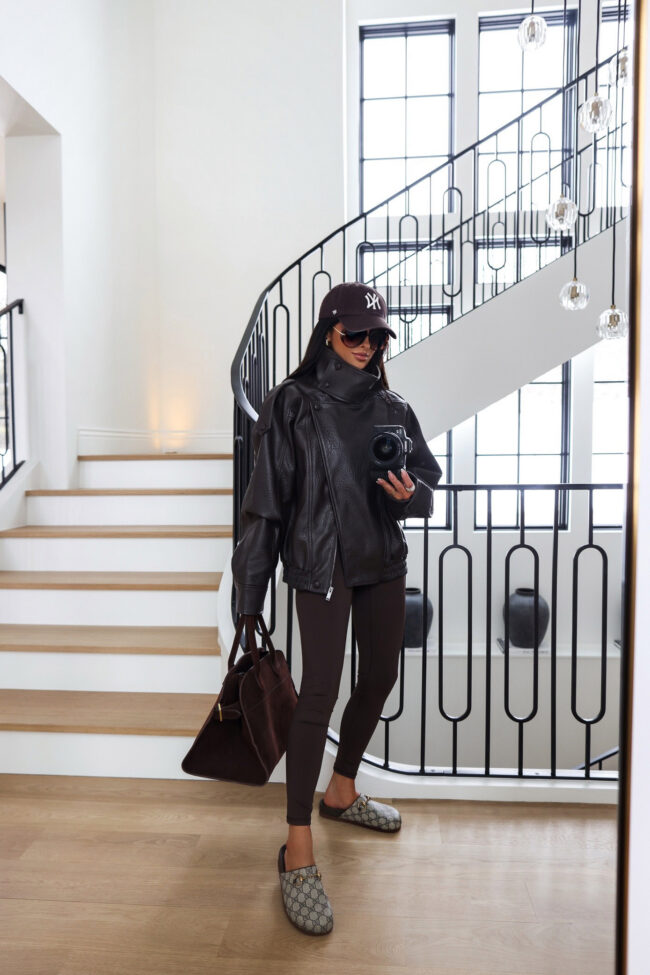 brunette fashion blogger wearing the gucci sol mules