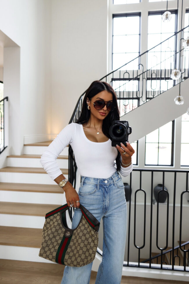 mia mia mine wearing a white long-sleeved top from amazon