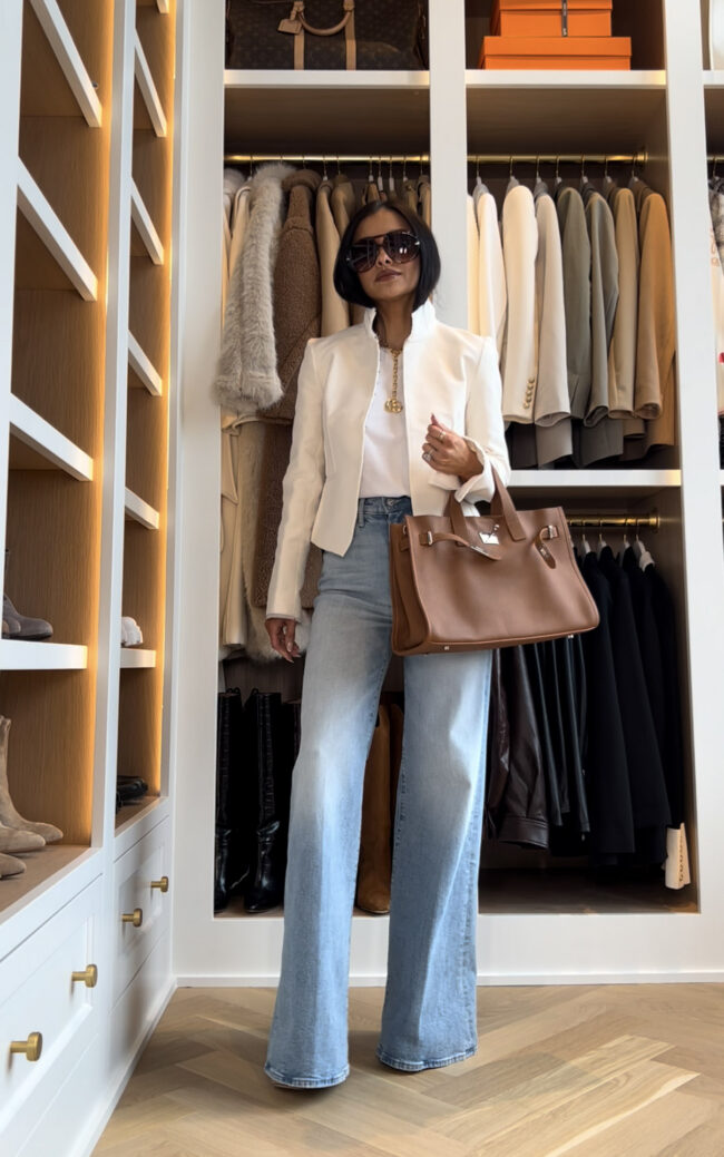 mia mia mine wearing a zara white blazer with an amazon hermes inspired tote