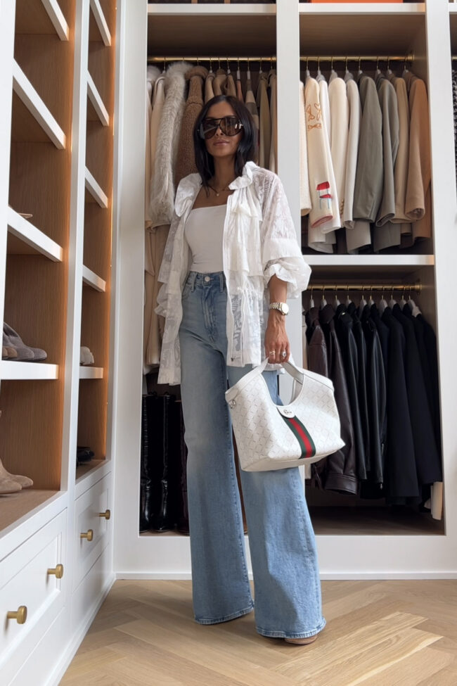 fashion blogger wearing a sheer white jacket from anthro for summer