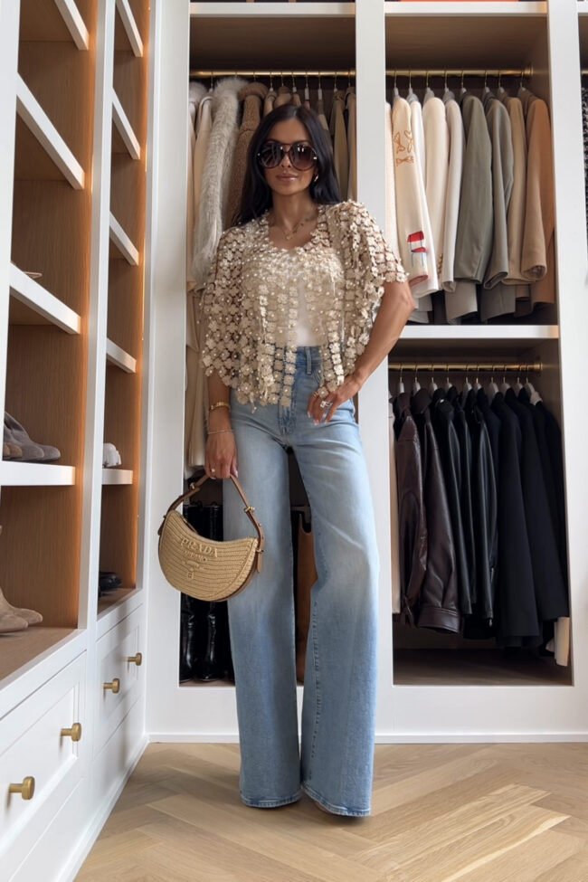 fashion blogger wearing a gold statement top from anthropologie