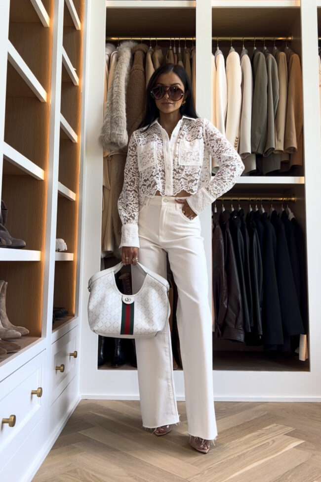 brunette fashion blogger wearing a l'agence lace top with a white gucci giglio bag