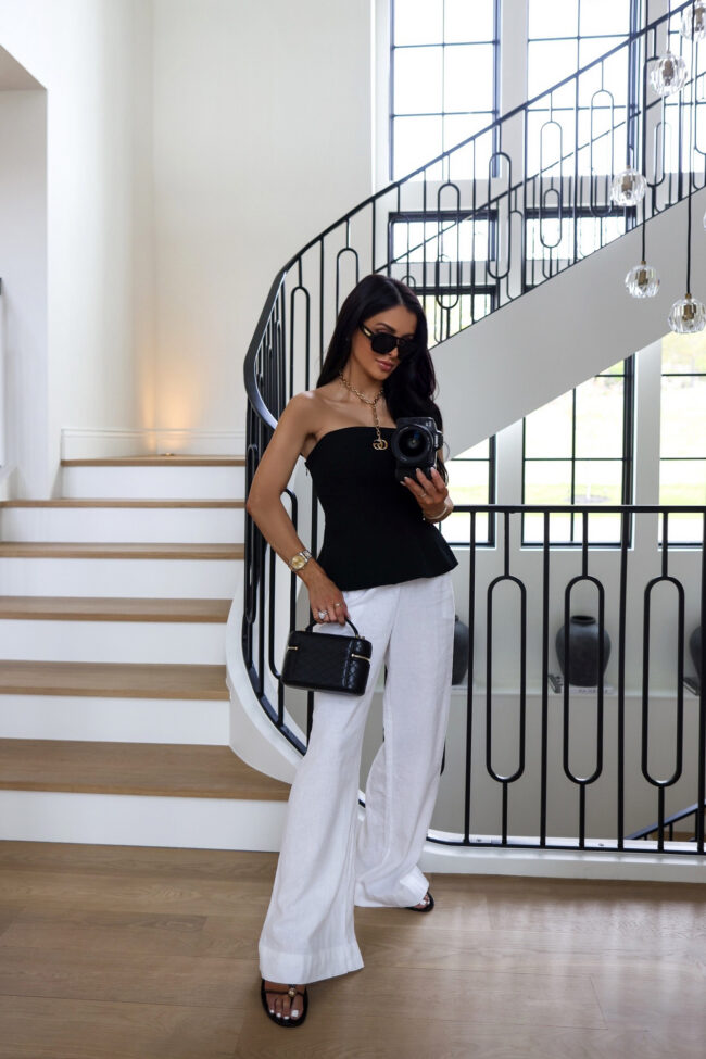 fashion blogger wearing white linen pants from target