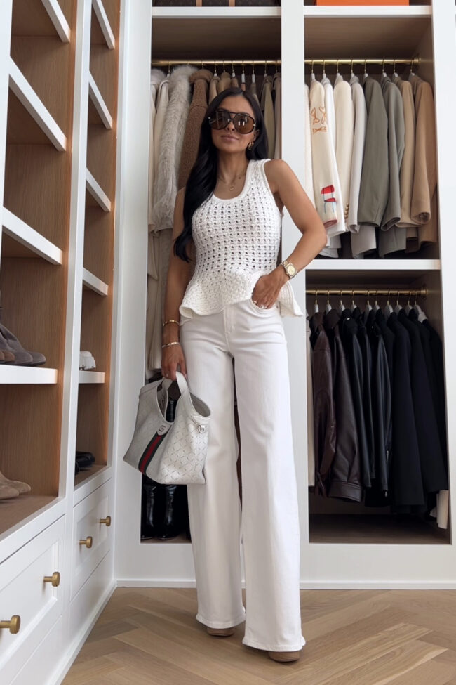 fashion blogger wearing a peplum eyelet top