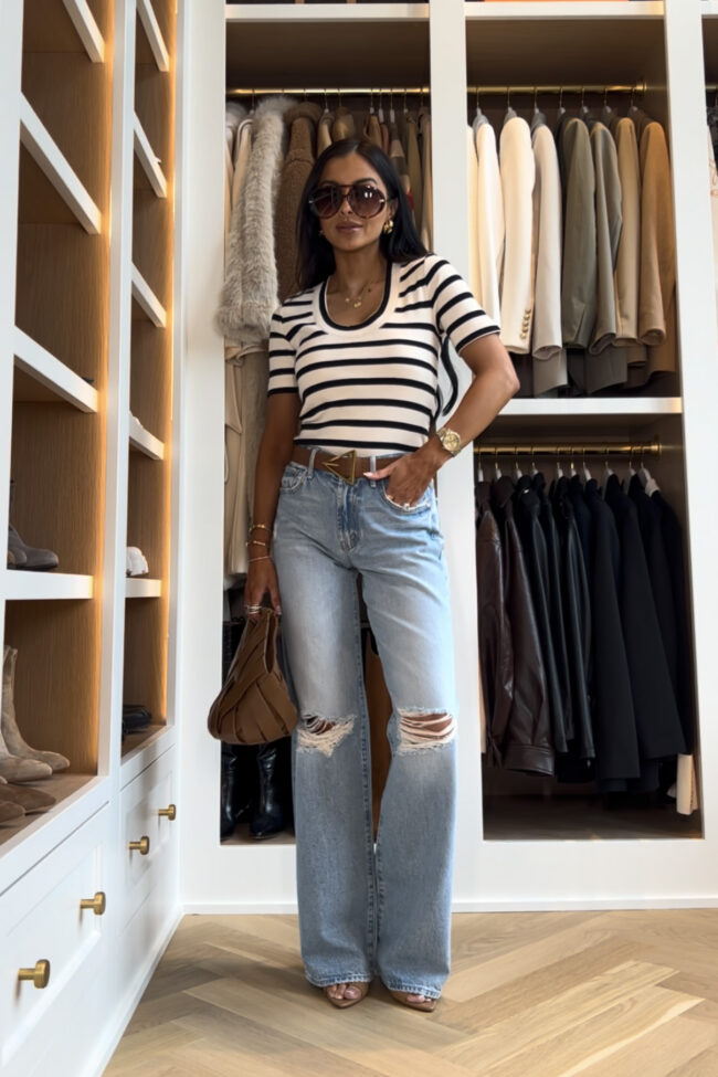 fashion blogger wearing a zara striped tee with bottega inspired accessories from amazon