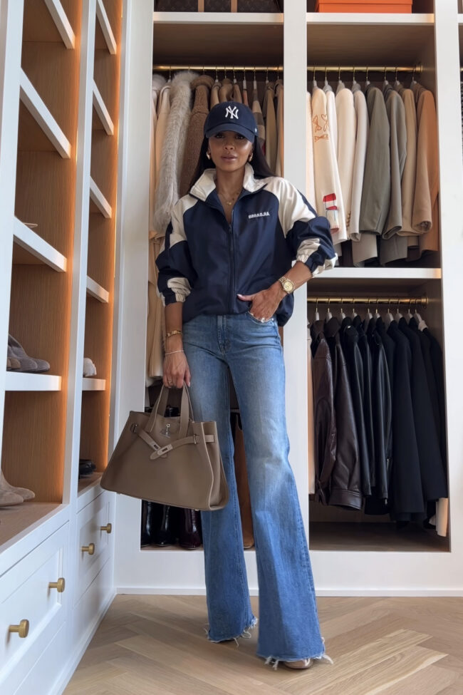 fashion blogger wearing a blue windbreaker jacket from amazon