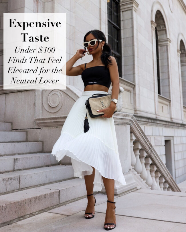 fashion blogger wearing a pleated white skirt for summer