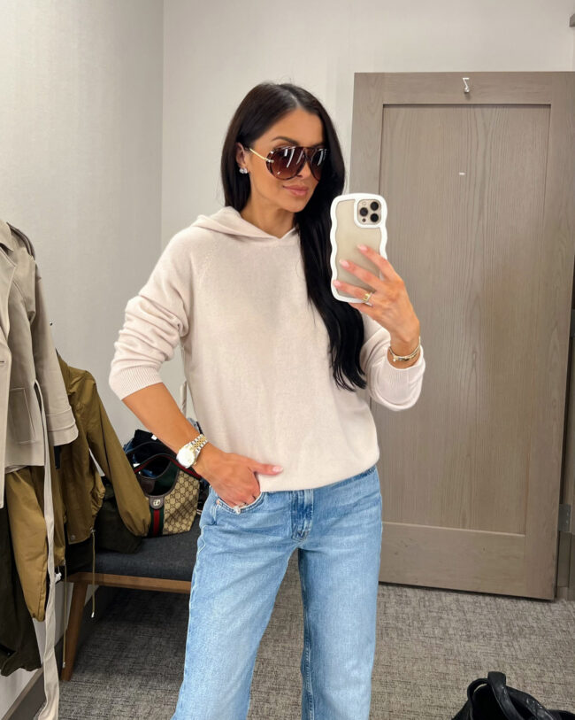 fashion blogger wearing a cashmere hoodie from the nordstrom anniversary sale