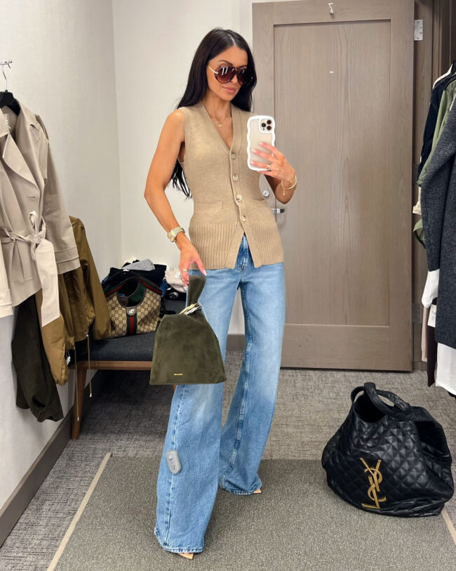 mia mia mine wearing a pistola knit vest with a veronica beard suede bag from the nsale