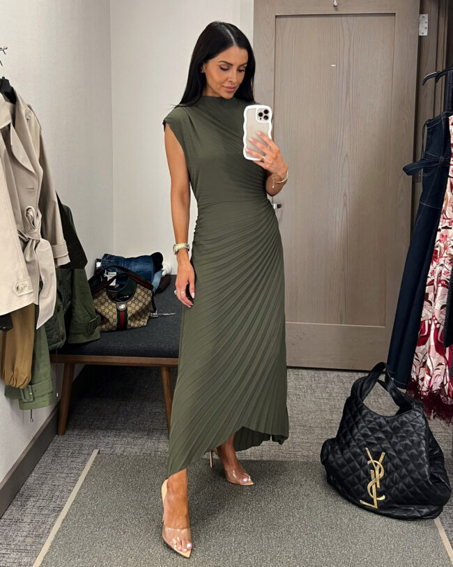 mia mia mine wearing a pleated green dress by allsaints from the nordstrom anniversary sale