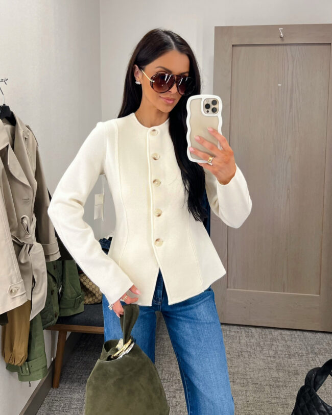 fashion blogger wearing a peplum jacket from the nsale