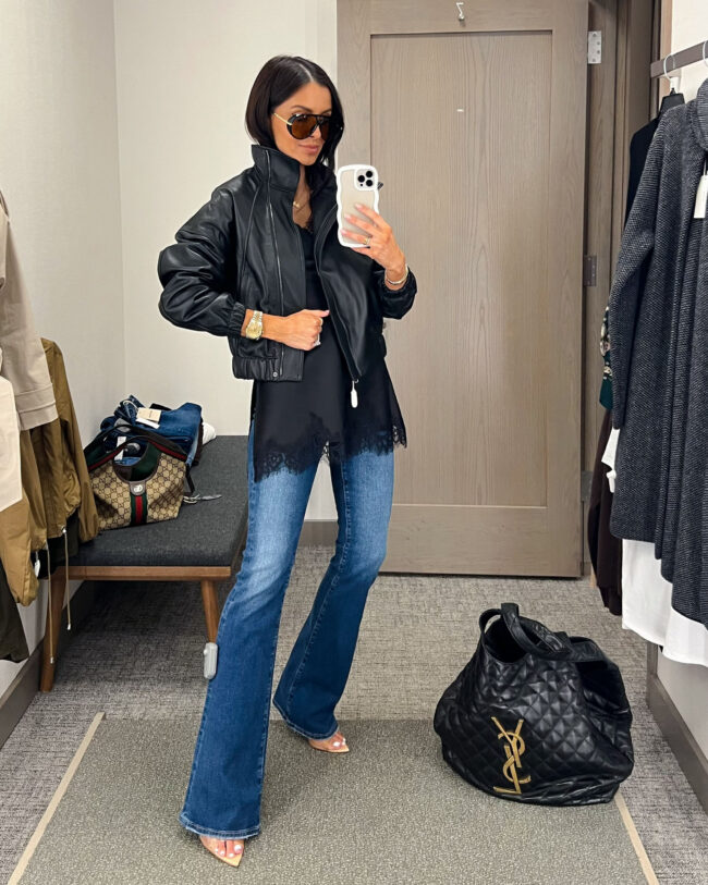 mia mia mine wearing a vince leather bomber jacket with ag bootcut jeans from the nordstrom anniversary sale