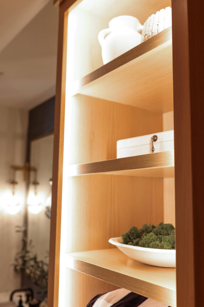White oak bathroom shelving with integrated AspectLED lighting