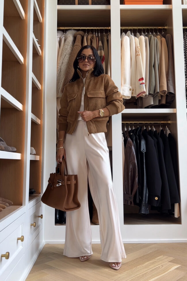 mia mia mine wearing a camel suede bomber jacket from zara