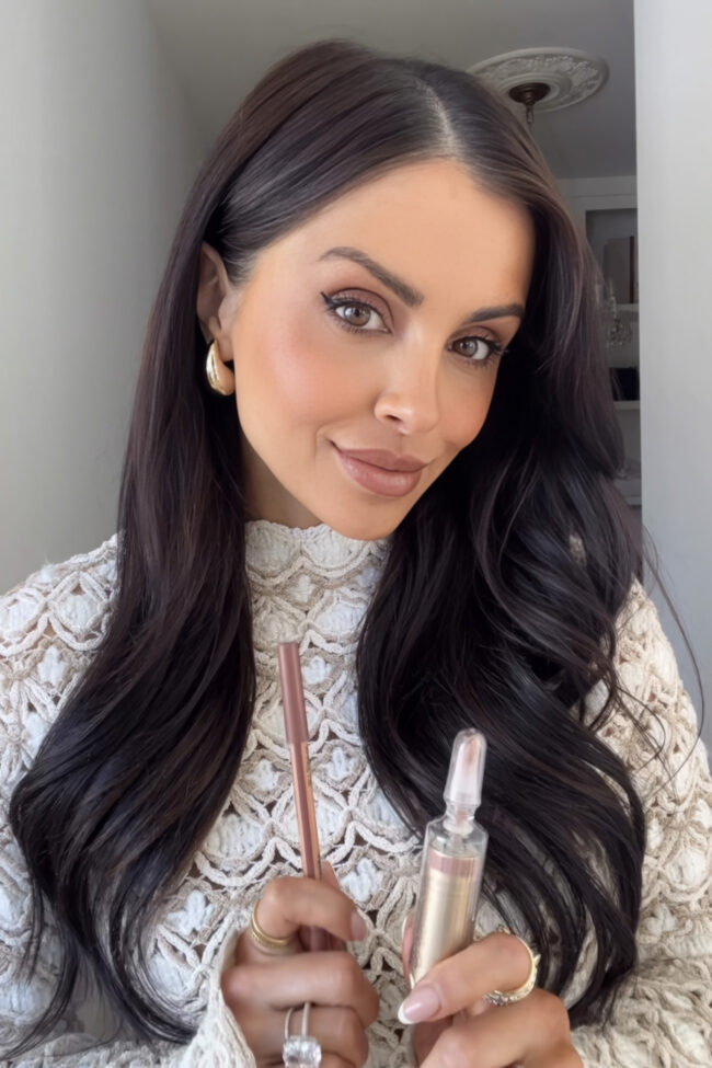 mia mia mine wearing a lip plumping gloss by dr. dennis gross