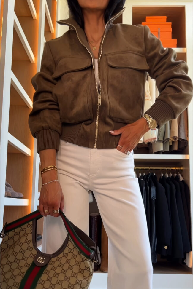fashion blogger wearing a suede bomber jacket from zara