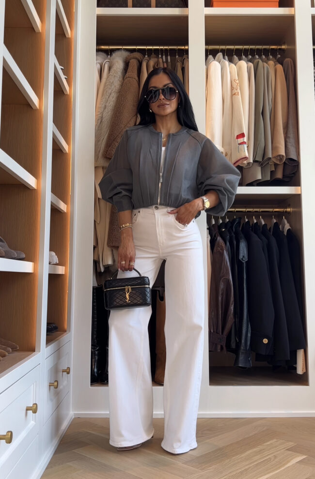 mia mia mine wearing a gray bomber jacket and white jeans from zara