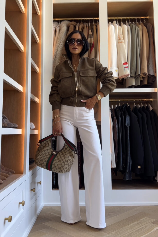 mia mia mine wearing a suede bomber jacket from zara