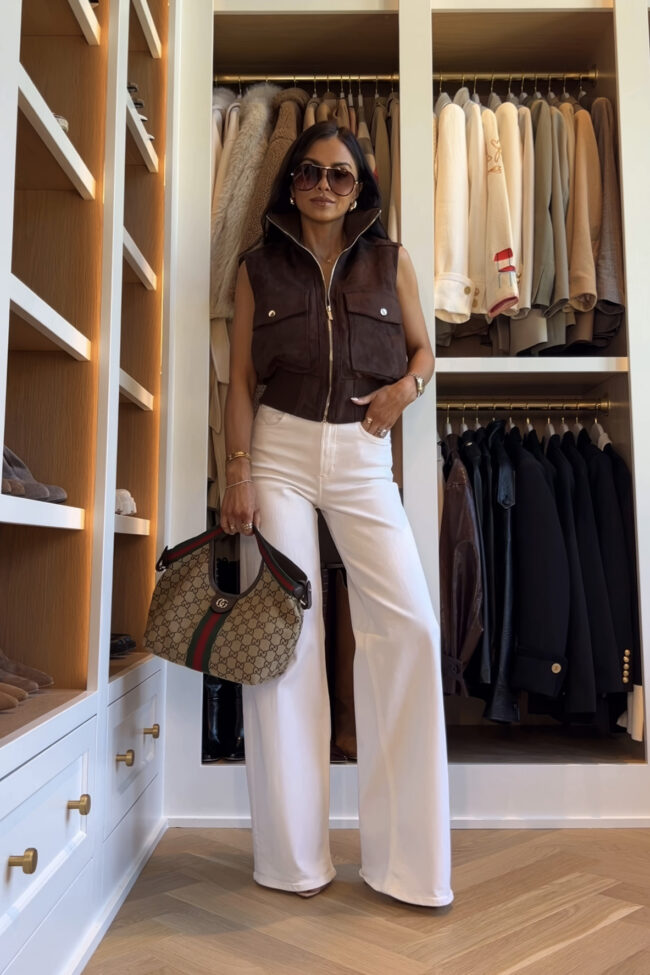 fashion blogger mia mia mine wearing a suede vest from zara