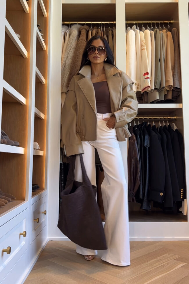 fashion blogger wearing a tan faux leather jacket