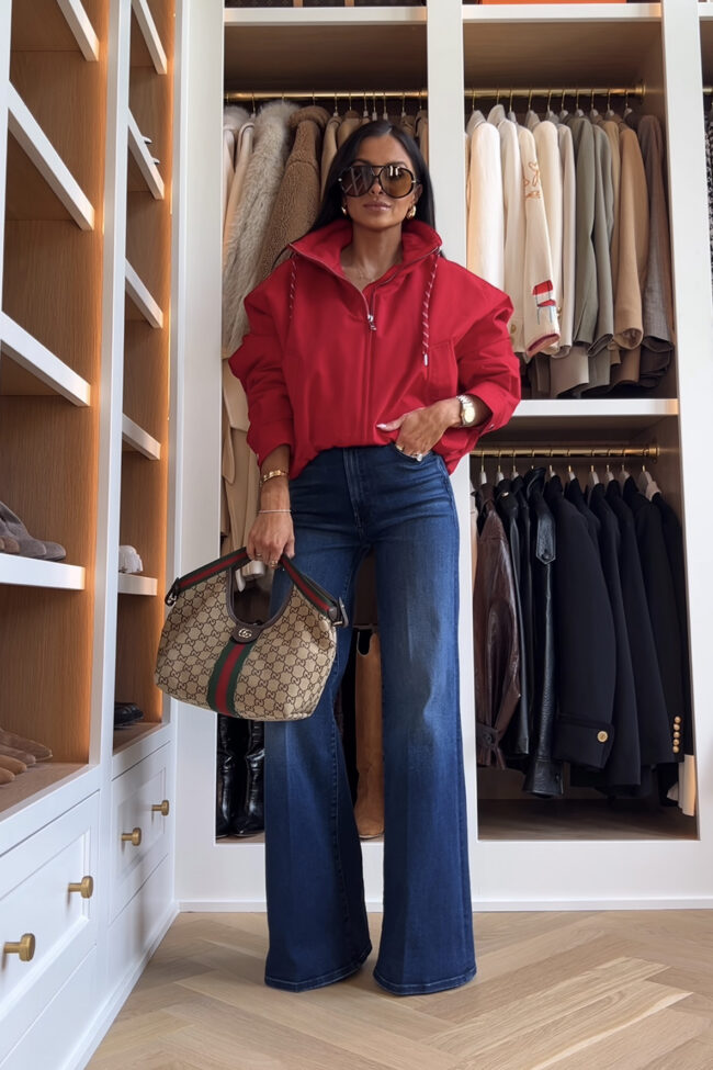 fashion blogger wearing a red bomber jacket for fall