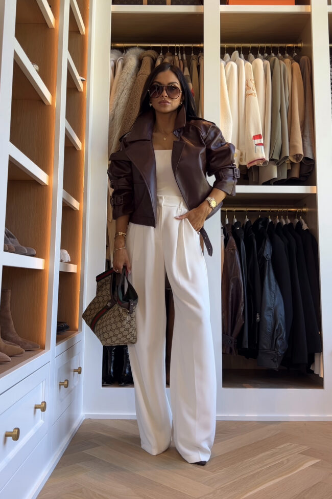 fashion blogger wearing a burgundy faux leather jacket from amazon