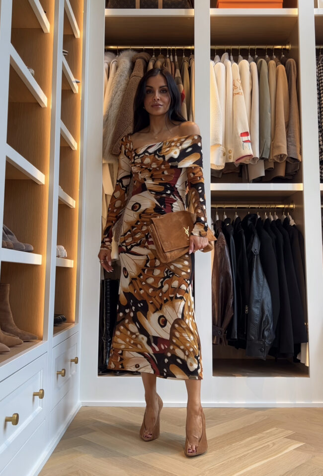 fashion blogger wearing a butterfly print dress by farm rio