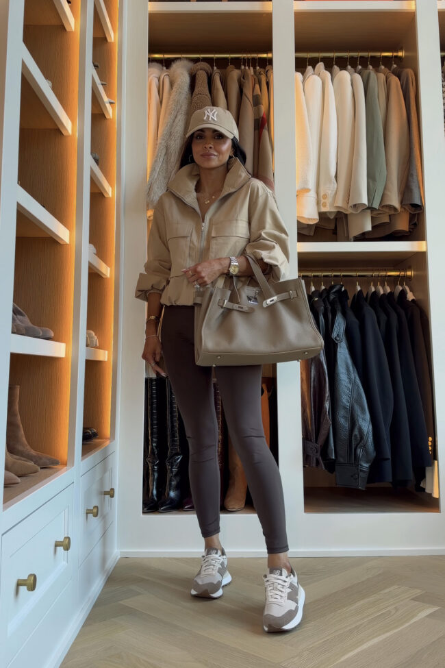 fashion blogger wearing an amazon jacket with new balance sneakers