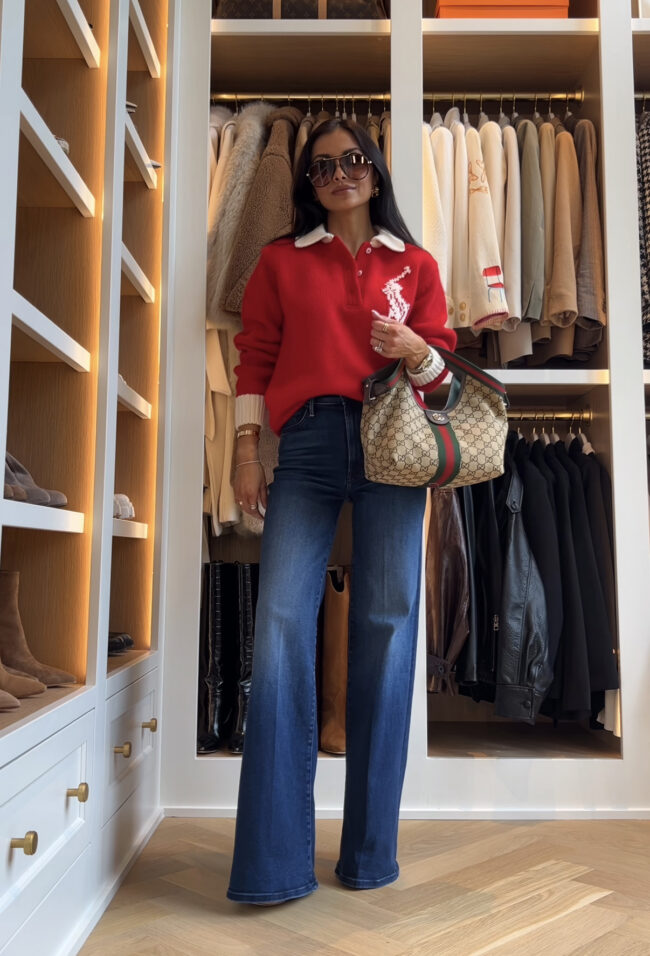 mia mia mine wearing a red polo sweater