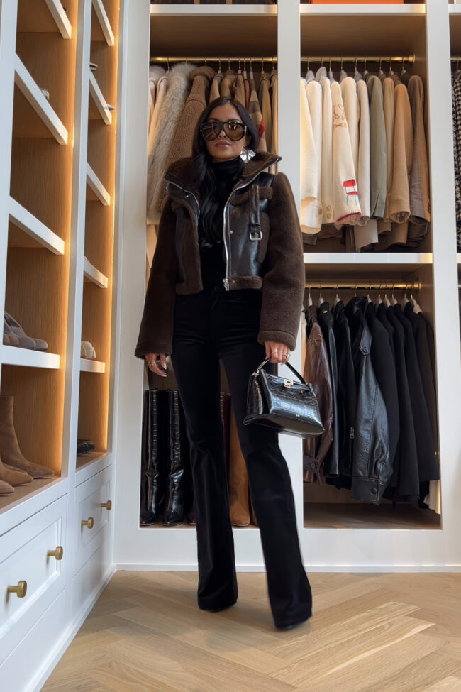 brunette fashion blogger wearing a blanknyc brown shearling moto jacket from macy's