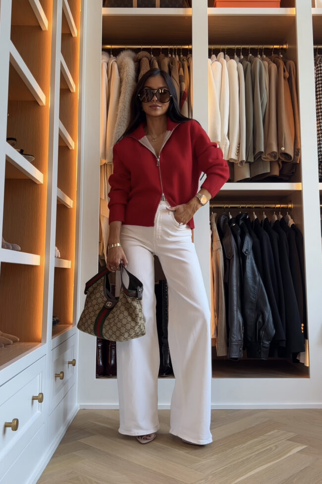 brunette fashion blogger wearing a zara red zip-up cardigan