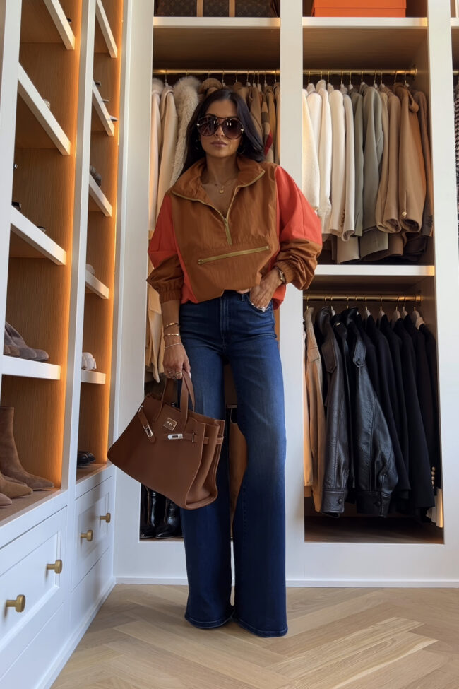 brunette fashion blogger wearing an a ysl-inspired windbreaker jacket from amazon